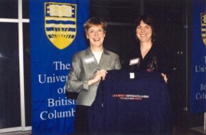 Copyright UBC Margo presenting a coveted Trek Program t-shirt to Martha Piper